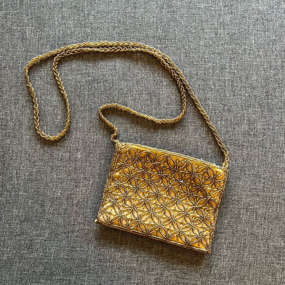 Beaded gold mini purse. Long cross-body strap.